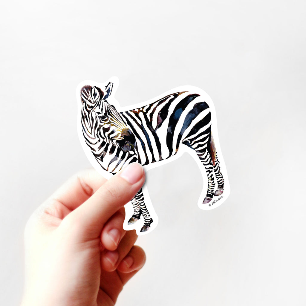 hand holding zebra vinyl sticker