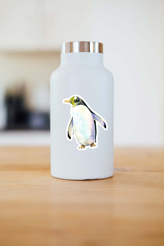 green and blue penguin sticker on white water bottle