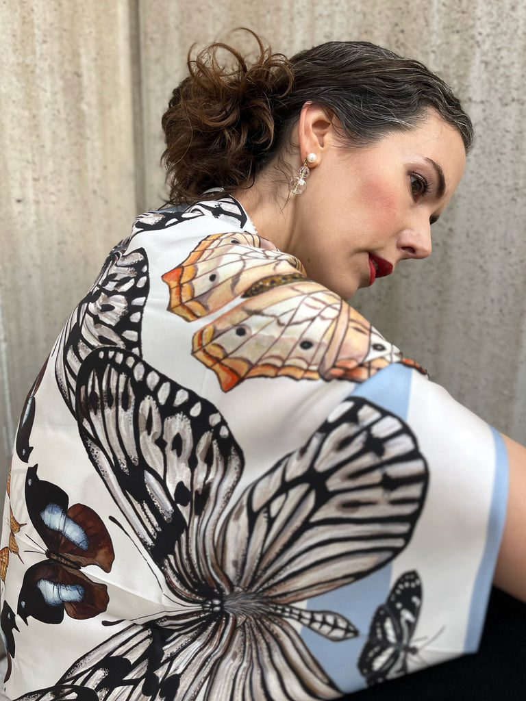 Black, Orange, Blue and White Butterfly Scarf Wrapped around model