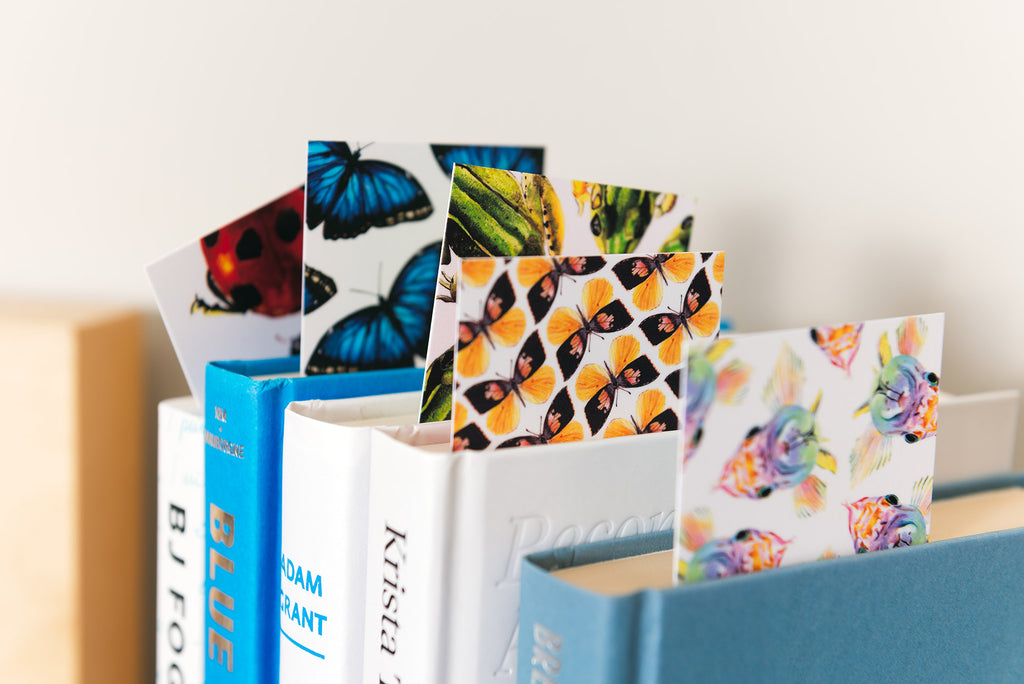 insect and animal bookmarks in books