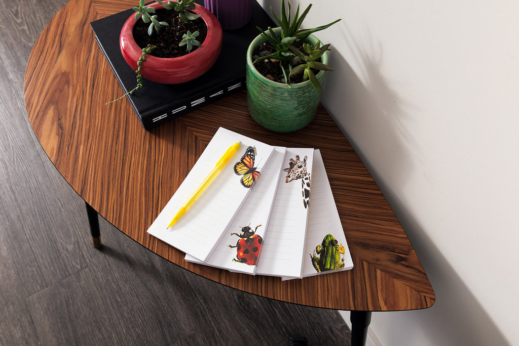 nature themed notepads on table
