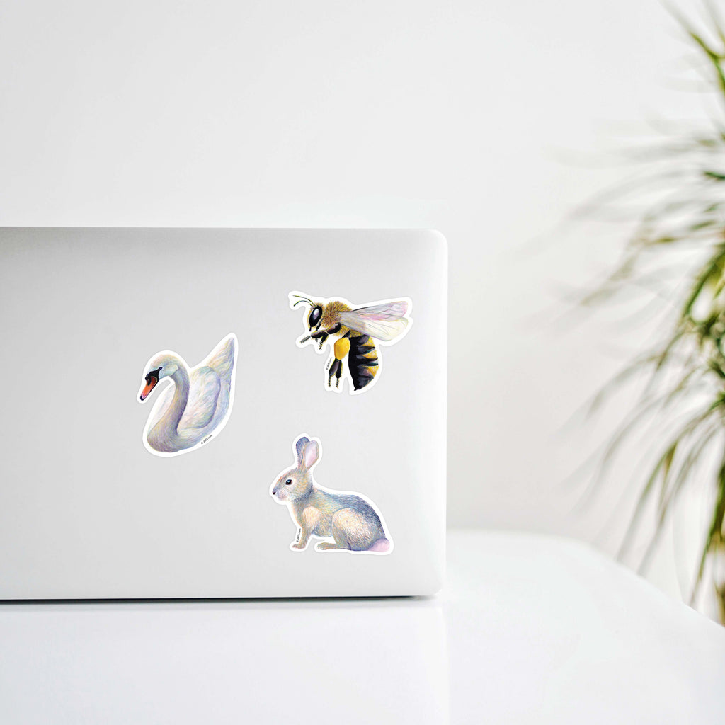 J6R6 Bee, Swan, and Bunny Vinyl Sticker on Laptop