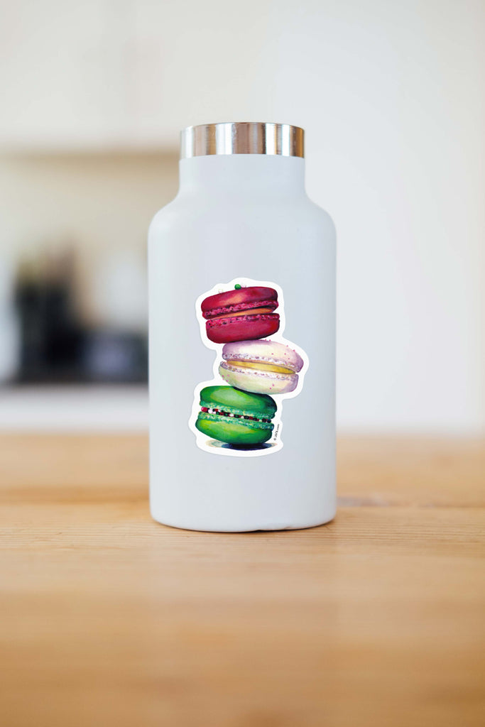 red, white, and green macaron sticker on water bottle
